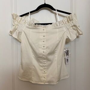 ANTONIO MELANI. Ivory Off the Shoulder Ruffle Blouse. Size: 2. NEW WITH TAGS